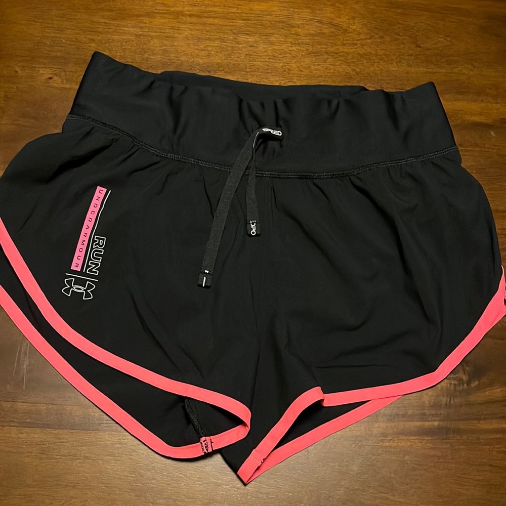 NWOT Womens Under Armour running shorts. Never been worn